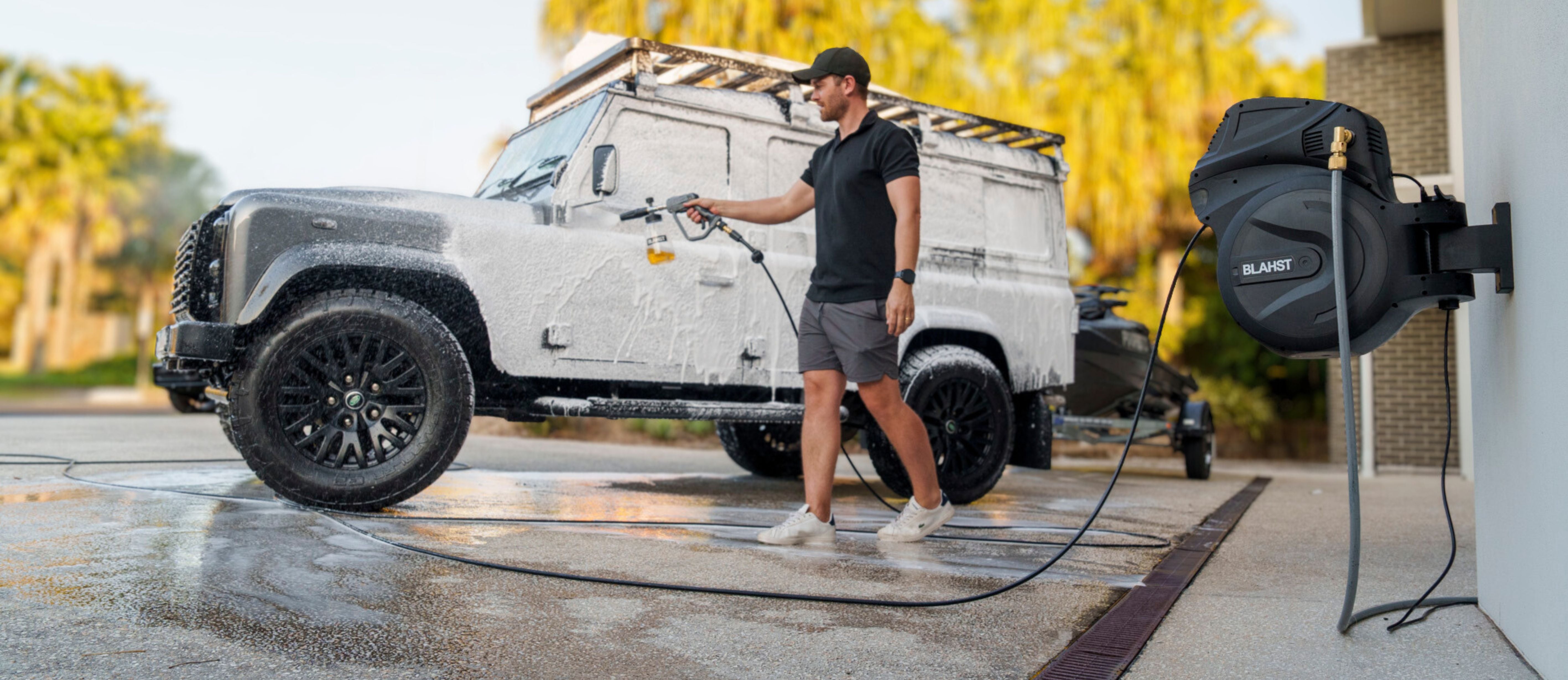 washing a car with foam using electric pressure washer